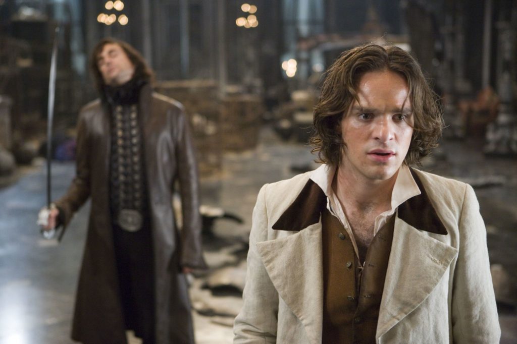 Young Tristan stands in front of an armed Prince Septimus, preparing to fight to save his love Yvaine.