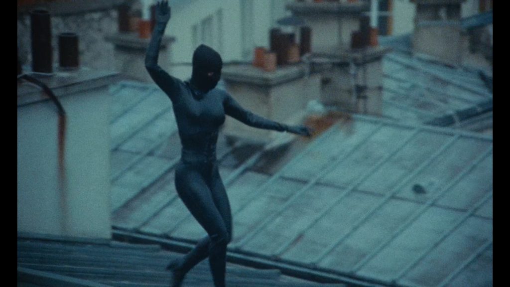 Someone in a black catsuit prowls the roofs of Paris in "Irma Vep."