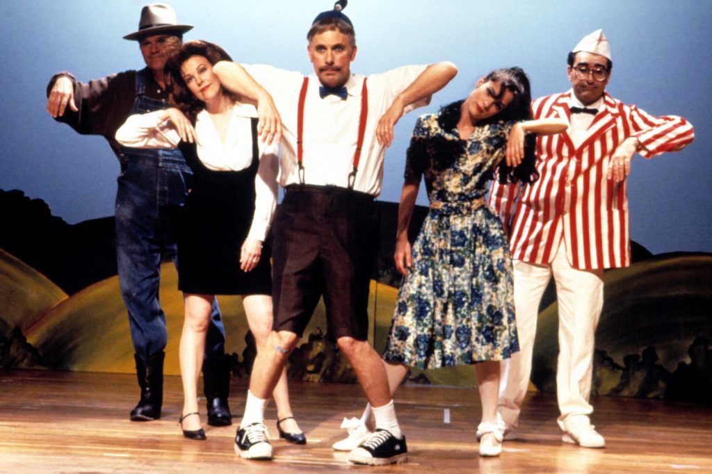 The cast perform a song and dance during the show.