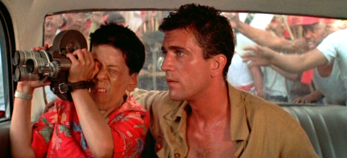 Linda Hunt and Mel Gibson in a scene from The Year of Living Dangerously. 