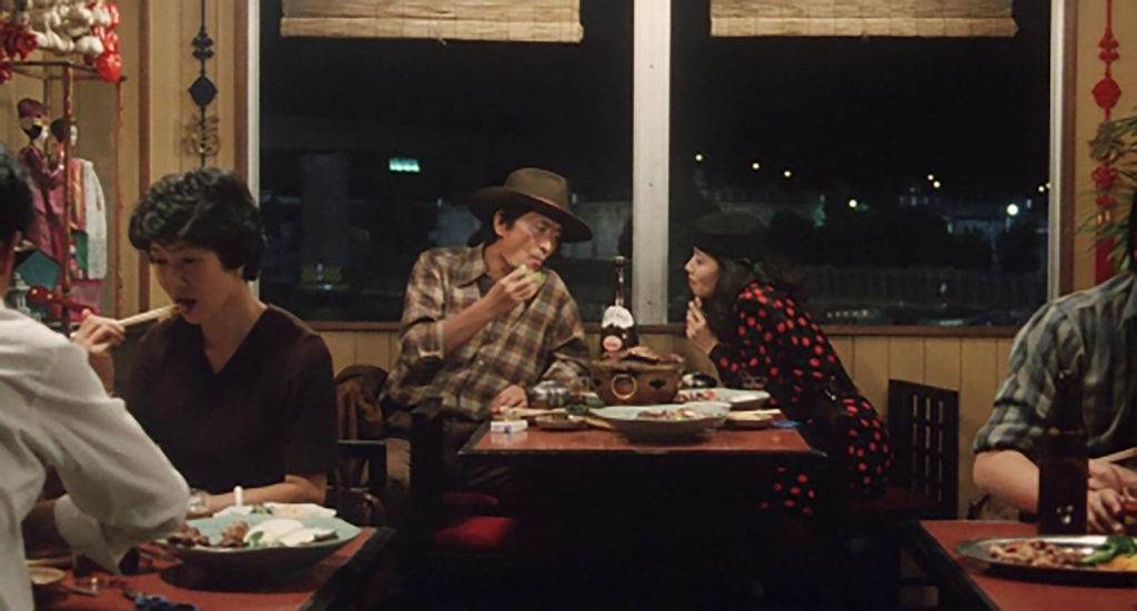 Goro and Tampopo enjoy an evening meal at a restaurant.