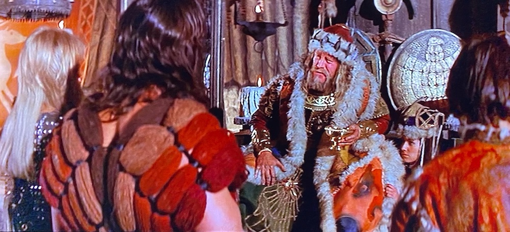 King Osric charges Conan and company with the quest to steal back his daughter from Thulsa Doom.