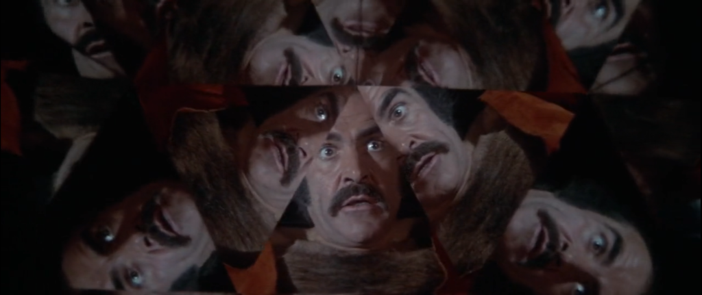 Sean Connery reflected in many triangular mirrors, his eyes bulging and moustache bristling.