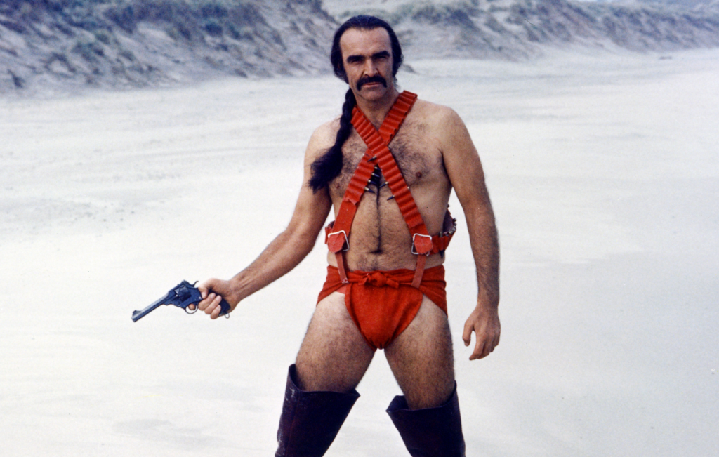 Sean Connery in a red nappy, knee-high leather boots, with a pony tail and Zappata mustache, and a revolver in hand.