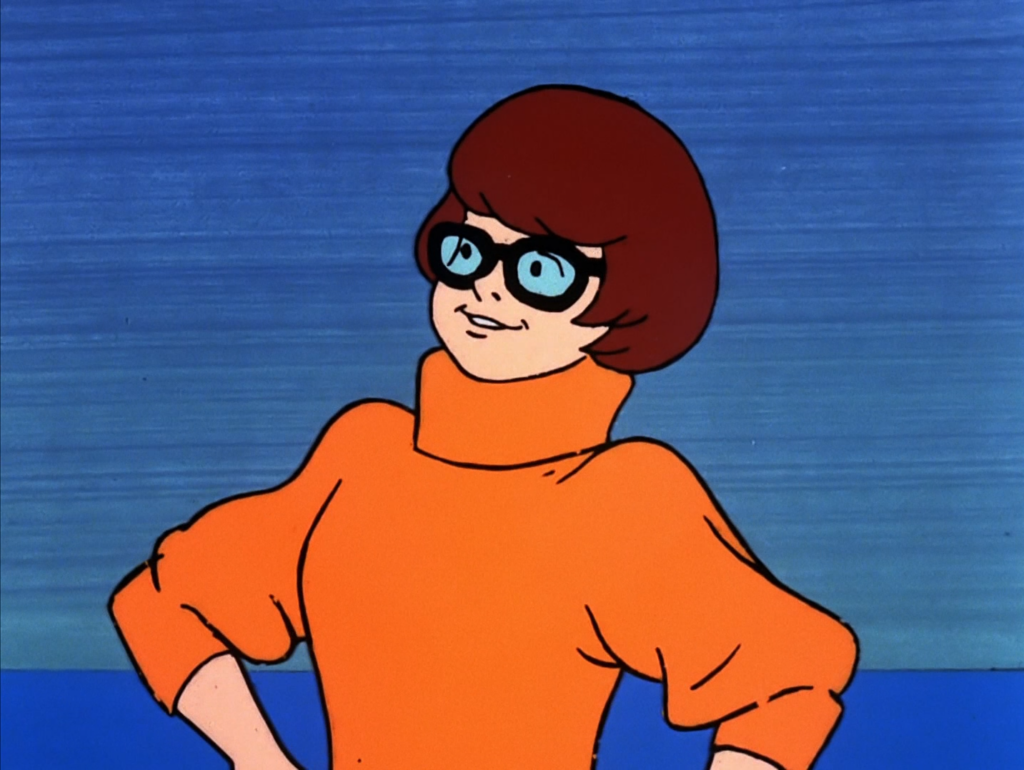 cartoon image of Velma Dinkley, character from Scooby-Doo.