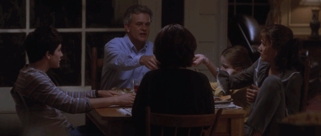 he Darko family—Donnie (Jake Gyllenhaal), his older sister Elizabeth (Maggie Gyllenhaal), his younger sister Samantha (Daveigh Chase), his mother Rose (Mary McDonnell), and his father Eddie (Holmes Osborne) all share dinner together across the dining room table.
