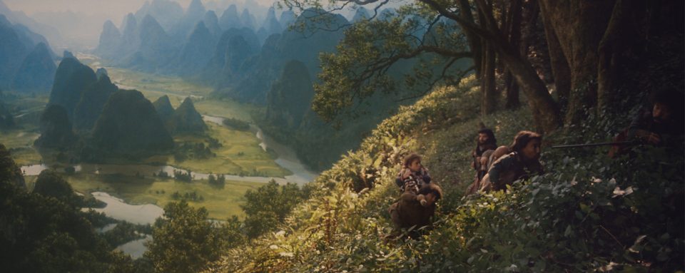 Willow (Warwick Davis) and his party beginning their journey with Elora.