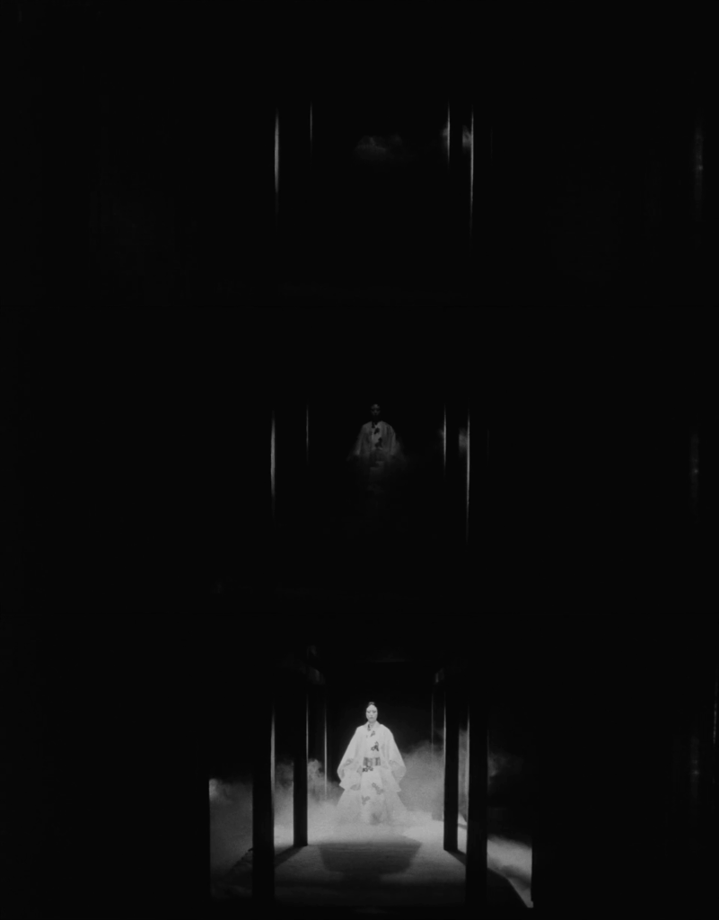 A stack of three images showing a woman gradually appearing in a dark room as the light gets more and more intense.