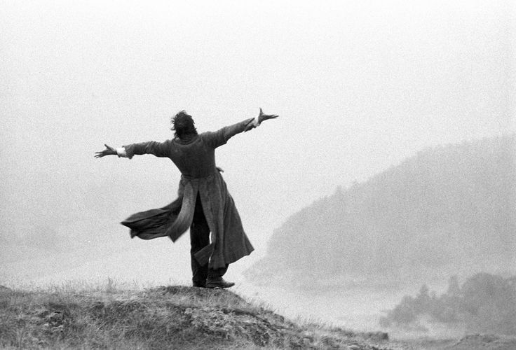 Withnail (Richard E. Grant) standing on top of a hill, his arms spread wide, yelling “Bastards! You’ll all suffer! I’m going to be a star!”