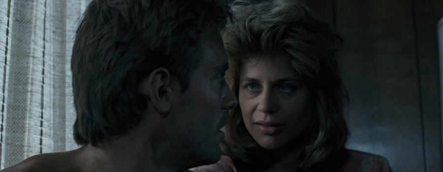 Sarah Connor and Kyle Reese have an intimate conversation in the Tiki Motel