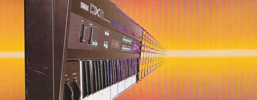 Illustration of a DX9 synthesizer against a laser-like blast of yellow, purple, and orange light.
