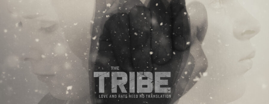 Film Poster for The Tribe, showing a stack of overlapping transparent B/W images of one young man, one young woman, and multiple hands making signs. All images aggregate in the middle, where the film's title appears, subtitled with "Love and Hate need no translation."