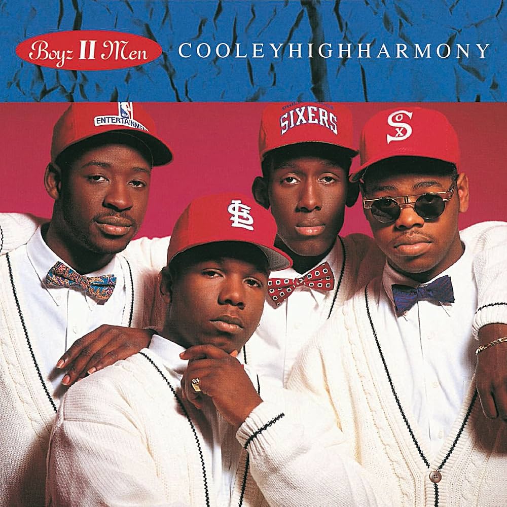 Cover of Boyz II Men's Cooleyhighharmony CD with the four members posing in their iconic preppy white sweaters and red baseball caps.